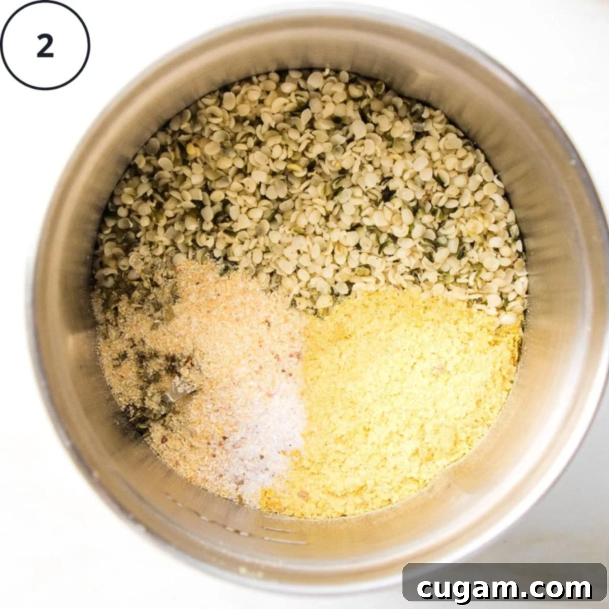 Quick Zucchini Pizza Bites 6 Hemp seeds, nutritional yeast, salt, garlic powder and oregano in a spice grinder.