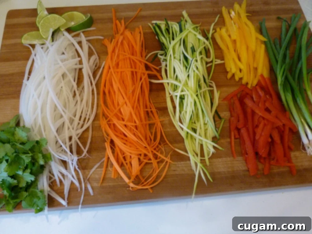 Gluten-free and Vegan Veggie Pad Thai, with prepped vegetables ready to cook.