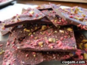 Festive Healthy Holiday Chocolate Bark with Raspberries and Pistachios