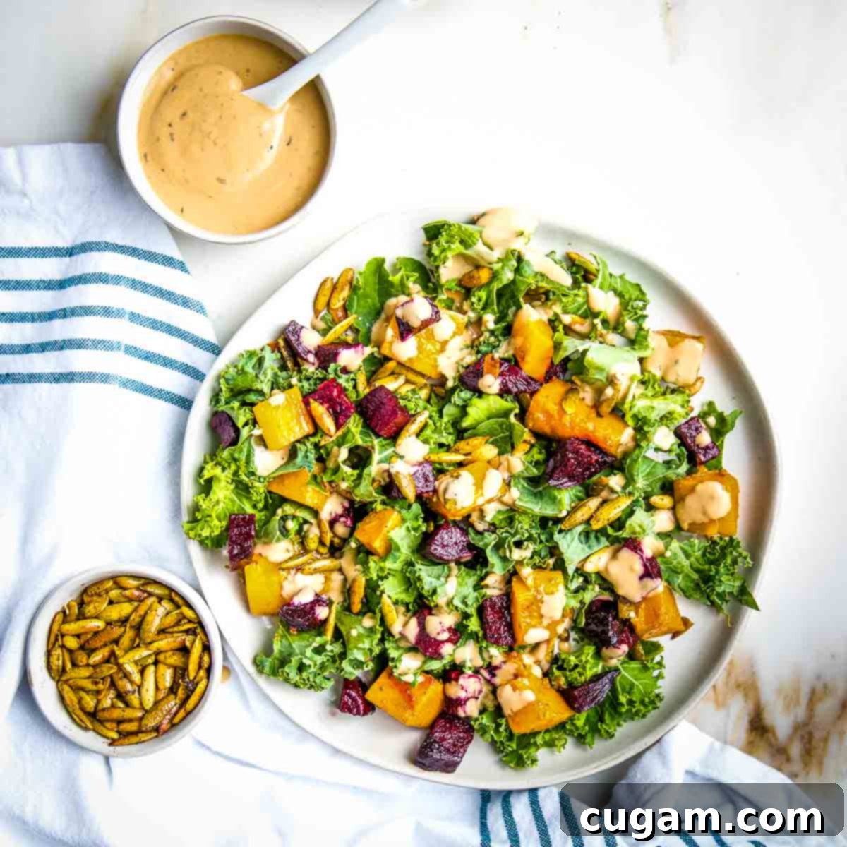 Colorful salad with roasted butternut squash and beets.
