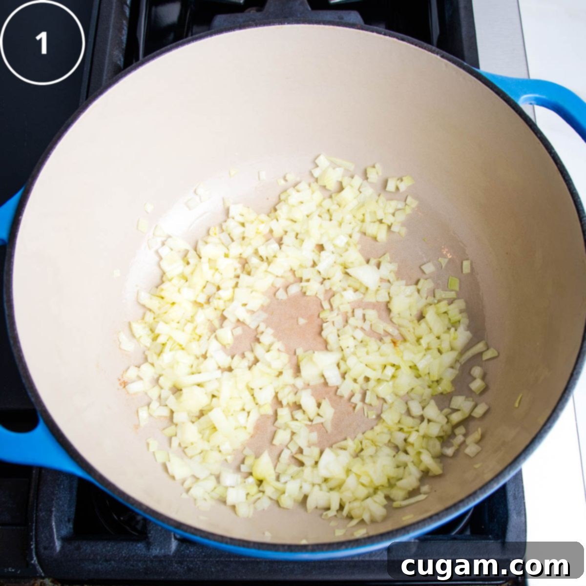 Onions for saute in blue dutch oven.