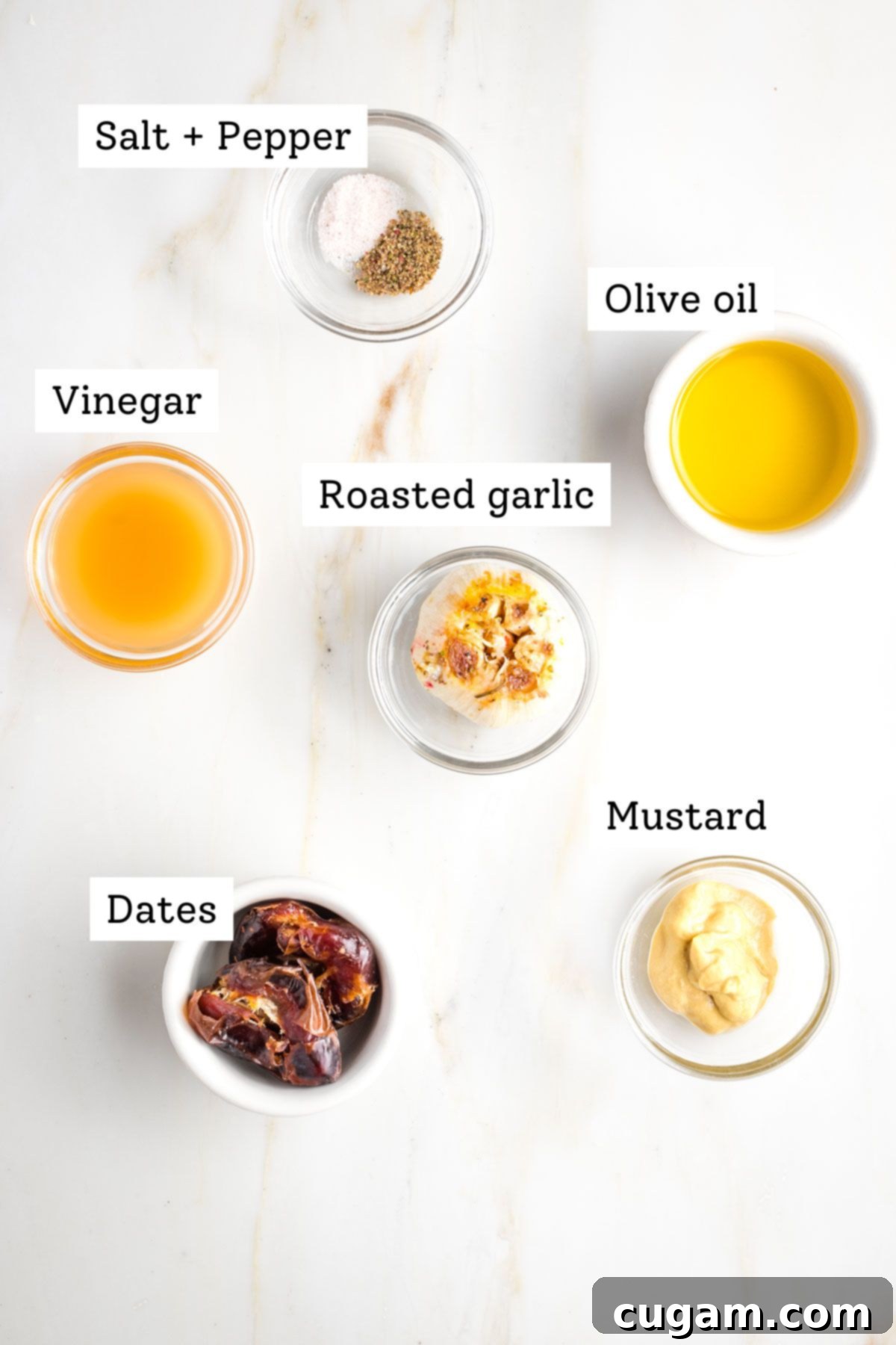 Labeled ingredients: salt and pepper, olive oil, vinegar, roasted garlic, dates, mustard. 