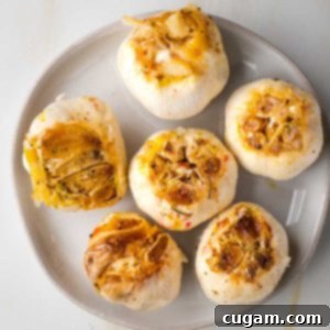 Whole heads of roasted garlic.