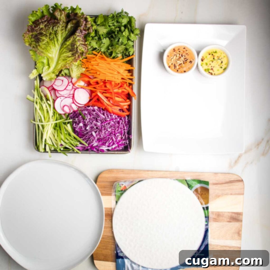 Crisp Veggie Spring Rolls with Creamy Peanut Sauce 9 Step-by-step imagery of rolling spring rolls