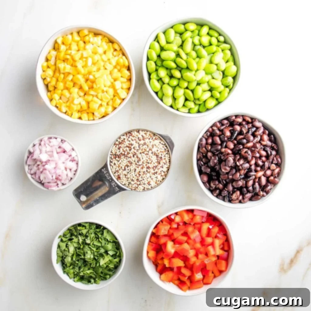 A vibrant collection of small glass bowls, each holding a distinct ingredient for the quinoa salad. The bowls contain bright yellow frozen corn kernels, fresh green shelled edamame, dark black beans, finely minced shallots, generously chopped fresh cilantro, raw uncooked quinoa grains, and neatly diced red bell peppers, all arranged to showcase the colorful components of the dish.