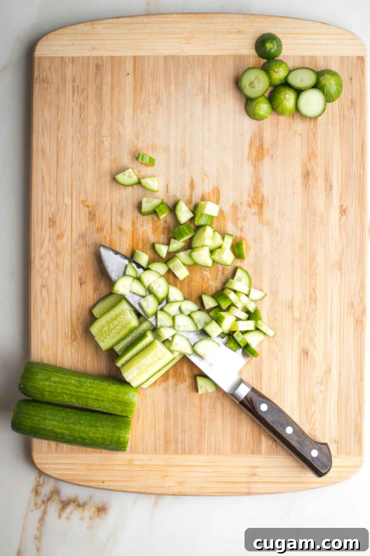 Cucumbers sliced lengthwise into ¼s and then small pieces.