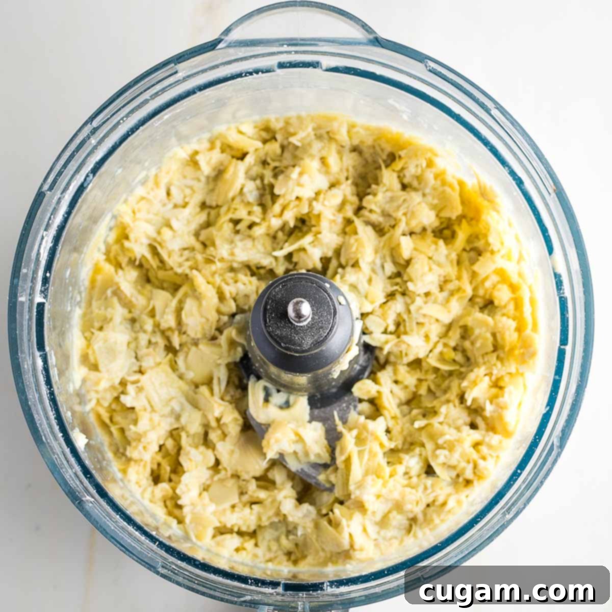 Artichoke hearts pulsed in a food processor to resemble crab meat.