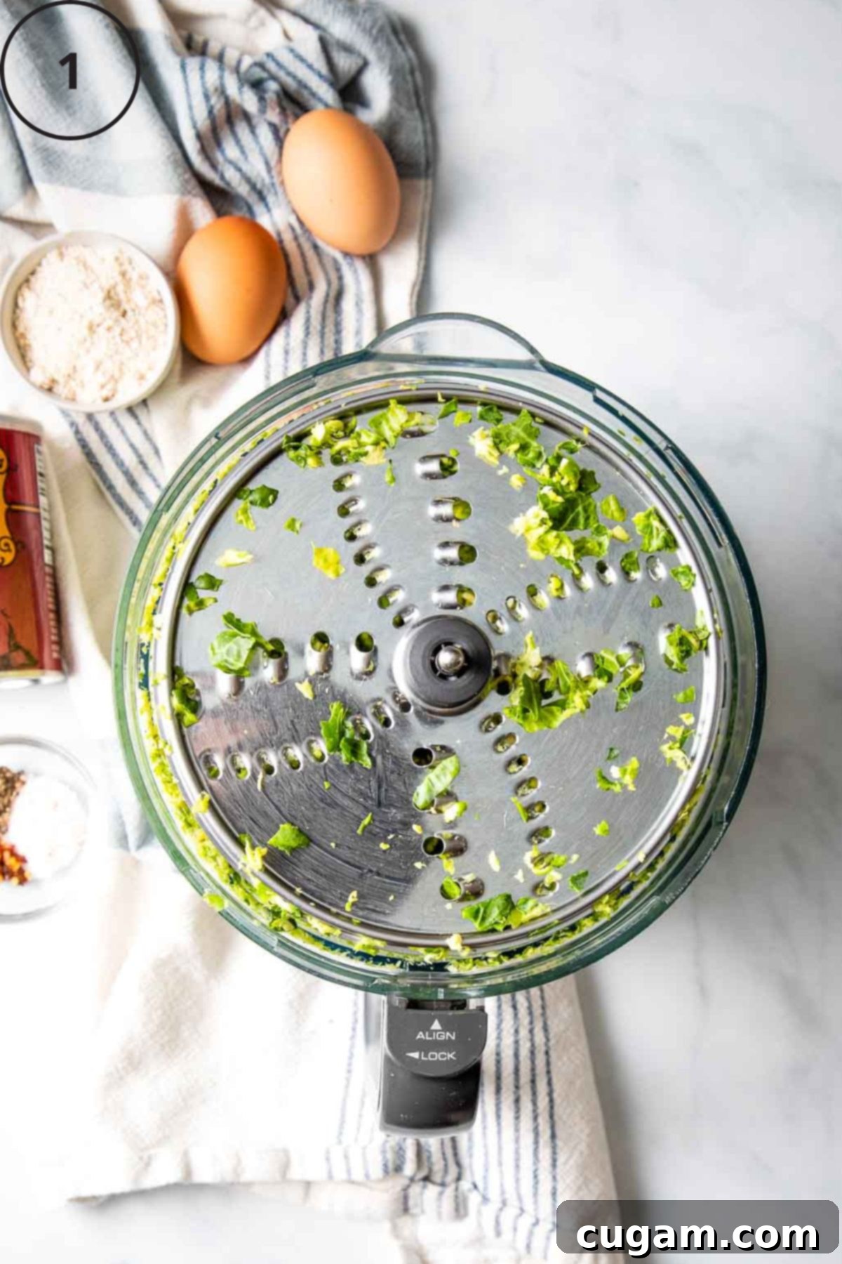 Shredding disc of food processor after shredding brussels sprouts.