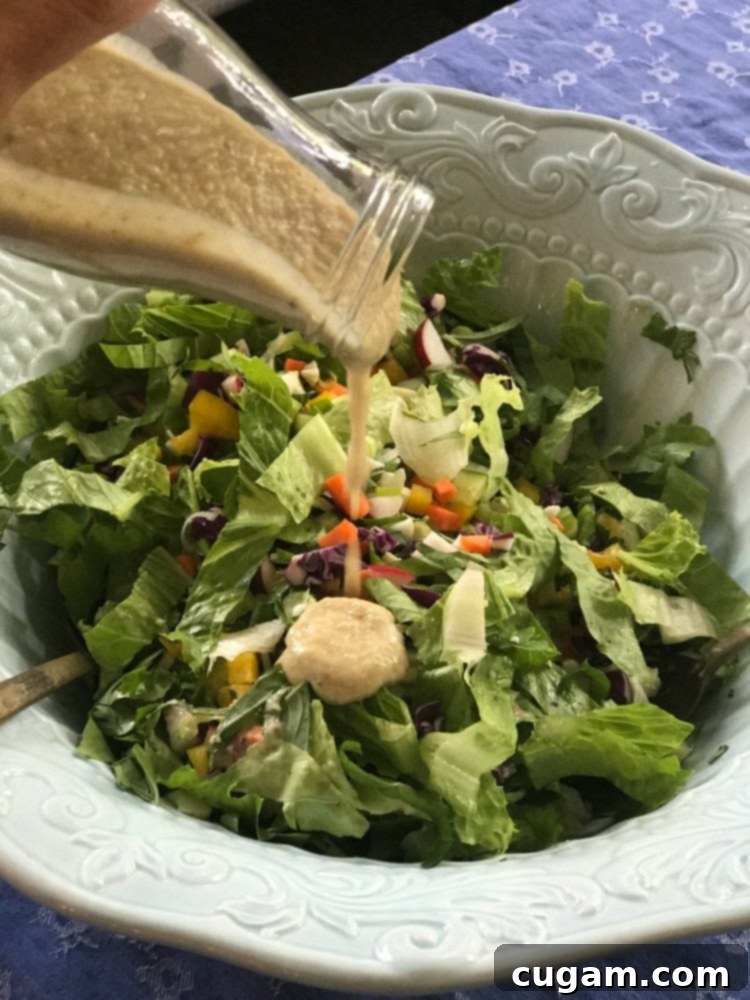 Creamy dairy-free dressing in a jar, perfect for chopped salad