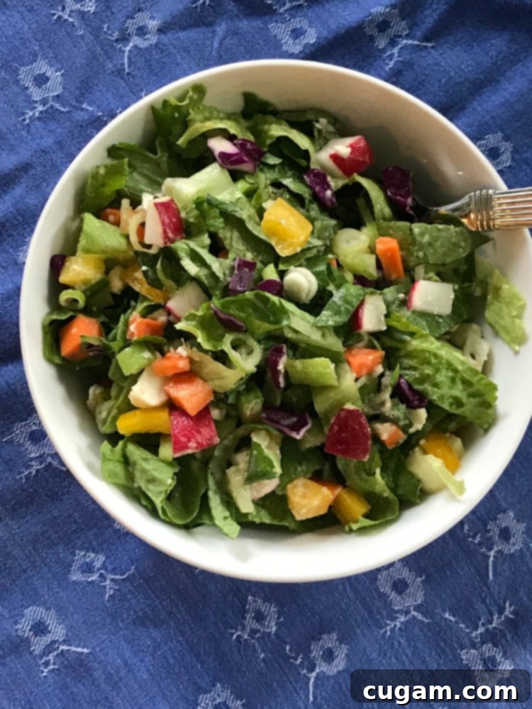A visually appealing and healthy chopped salad, full of color