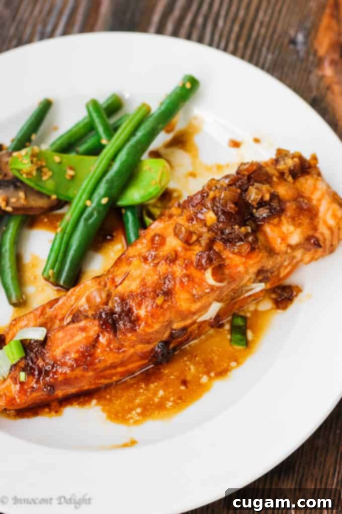 Beautiful grilled salmon with homemade teriyaki sauce, ready to be served.