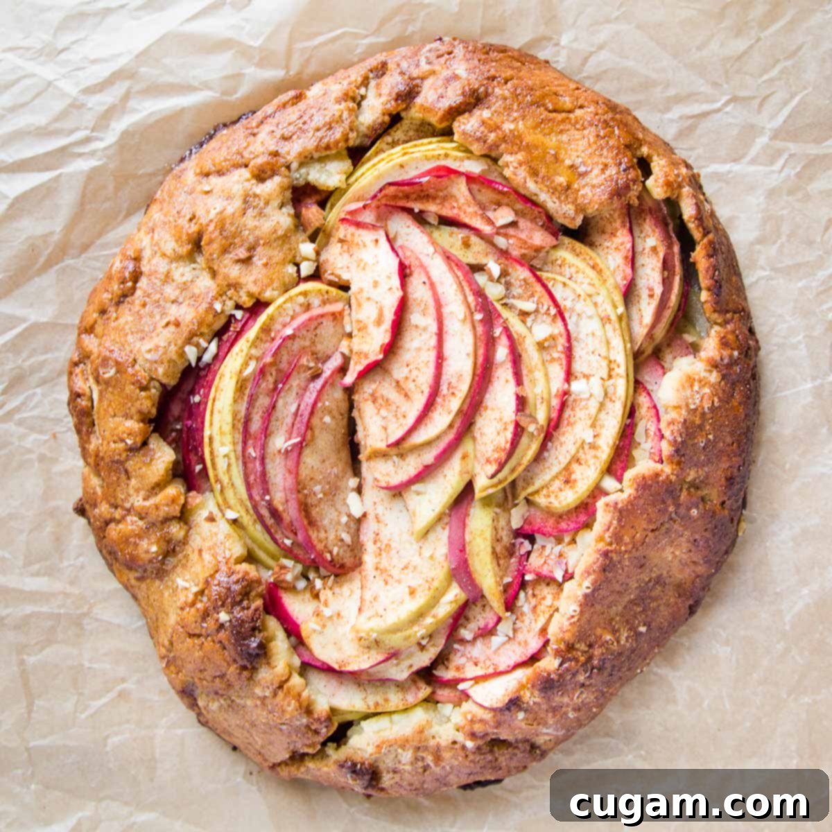 Free form galette filled with thin slices of apples in a grain-free crust.