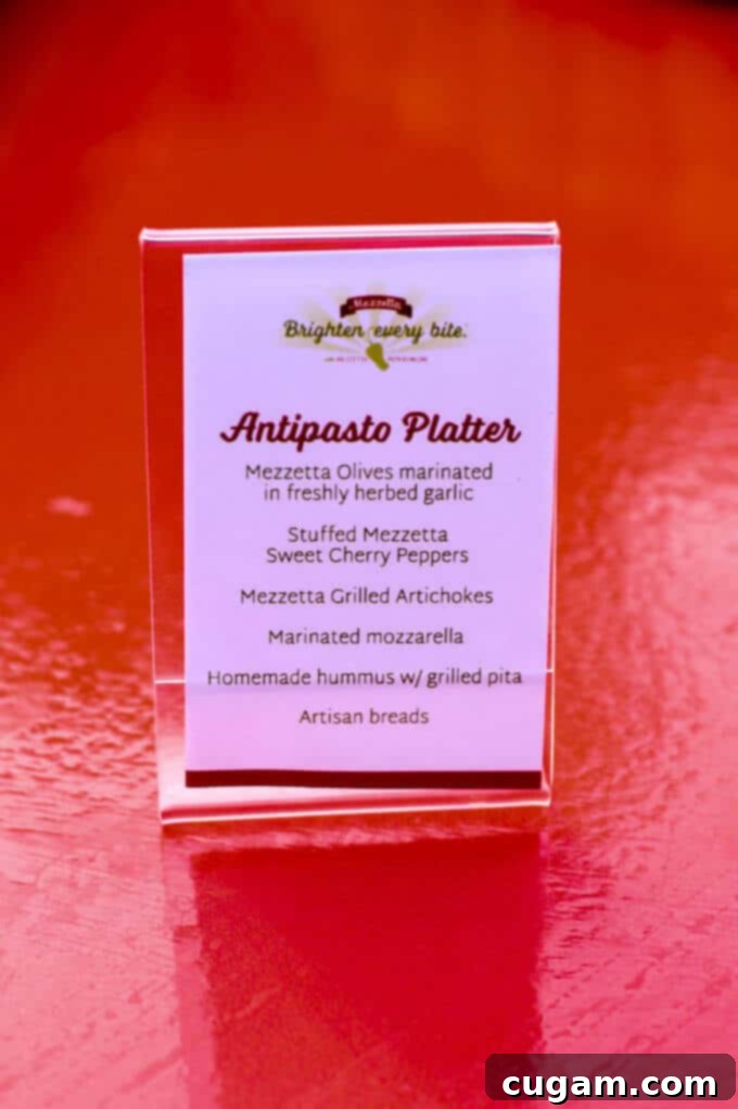 A lavish Antipasto Platter, featuring a rich assortment of Mezzetta olives, peppers, and other delicacies
