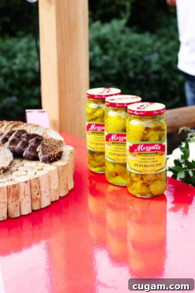 Guests enjoying conversations and the festive atmosphere at the exclusive Mezzetta pop-up event