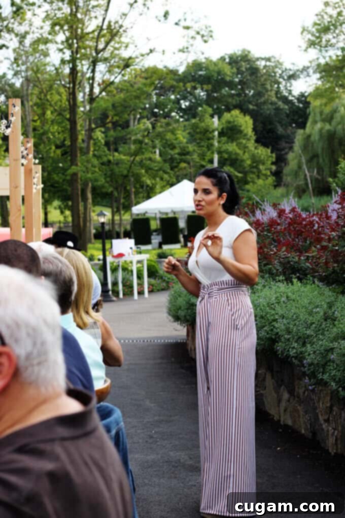Laura Vitale sharing her insights on Mezzetta peperoncini's quality and versatility with event attendees