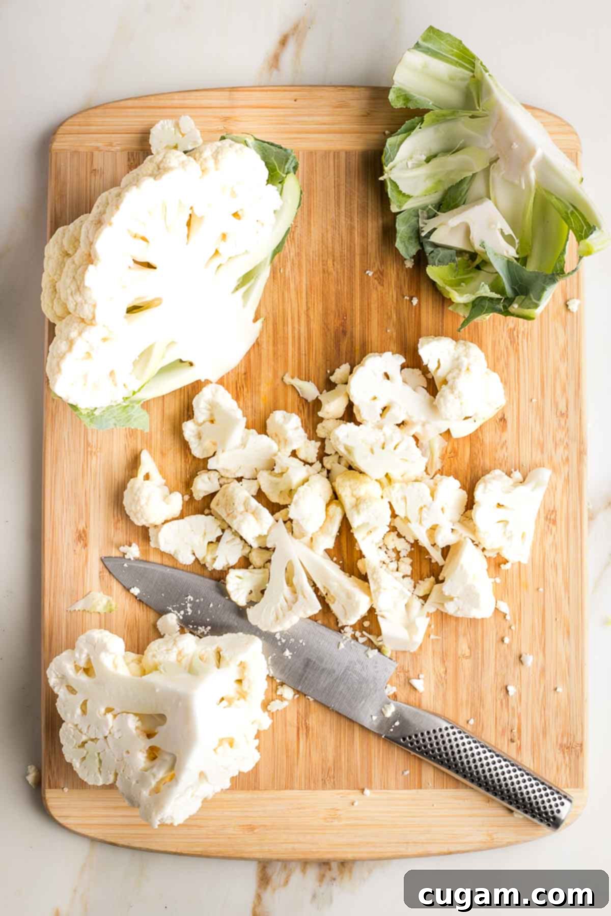 Cauliflower, cut in half, trimmed and roughly chopped. 