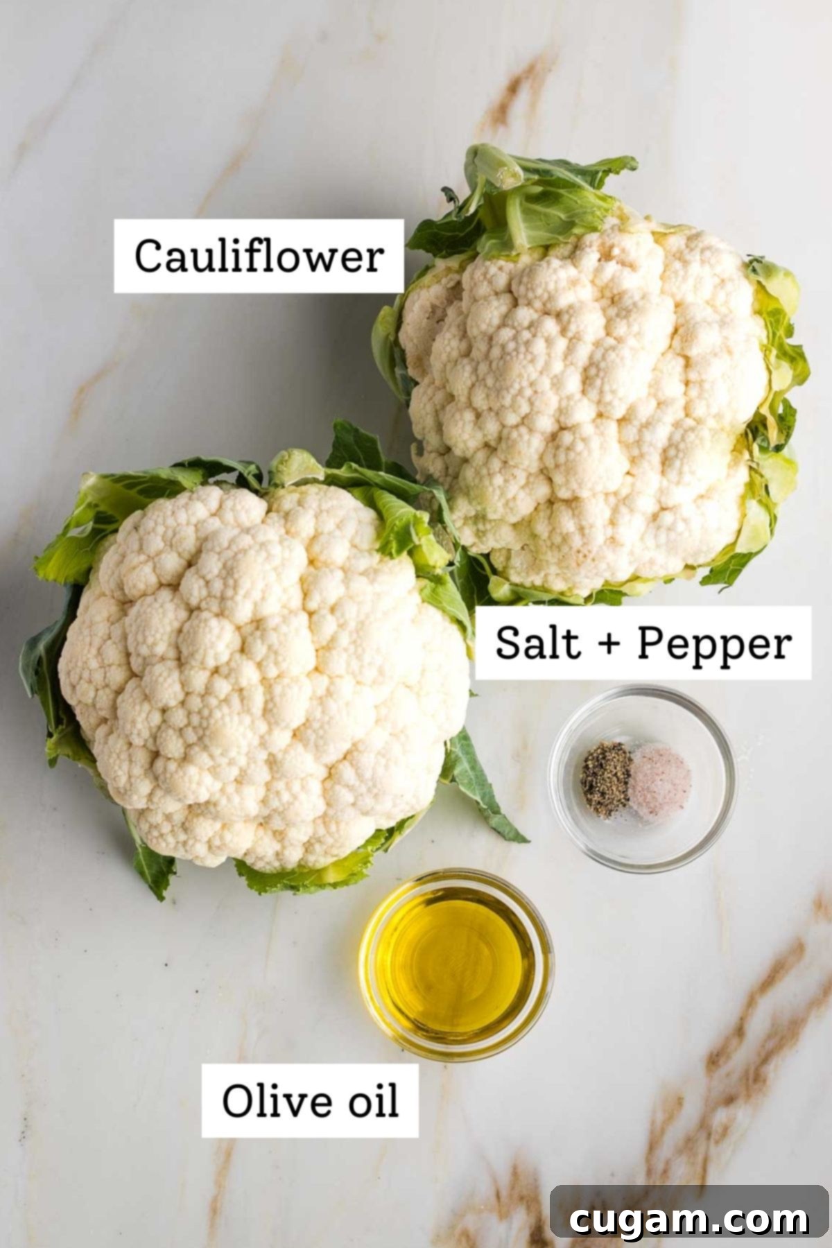 Labeled photo with a whole head of cauliflower, a bottle of olive oil, and a sprinkle of salt and black pepper.