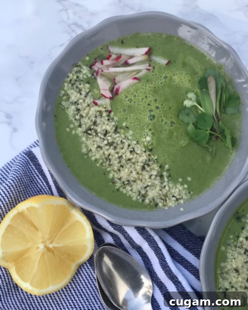 Five bowls of vibrant Spring Greens Soup, garnished differently, arranged on a wooden table, emphasizing taste and nutrition.