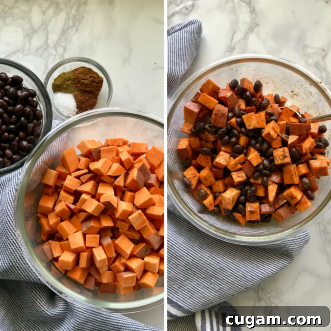 A beautifully arranged vegan enchilada bowl, showcasing roasted sweet potatoes, black beans, various fresh vegetables, and a creamy sauce, ready for a healthy meal.