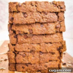 Stack of thick slices of banana bread with chocolate mini chips.