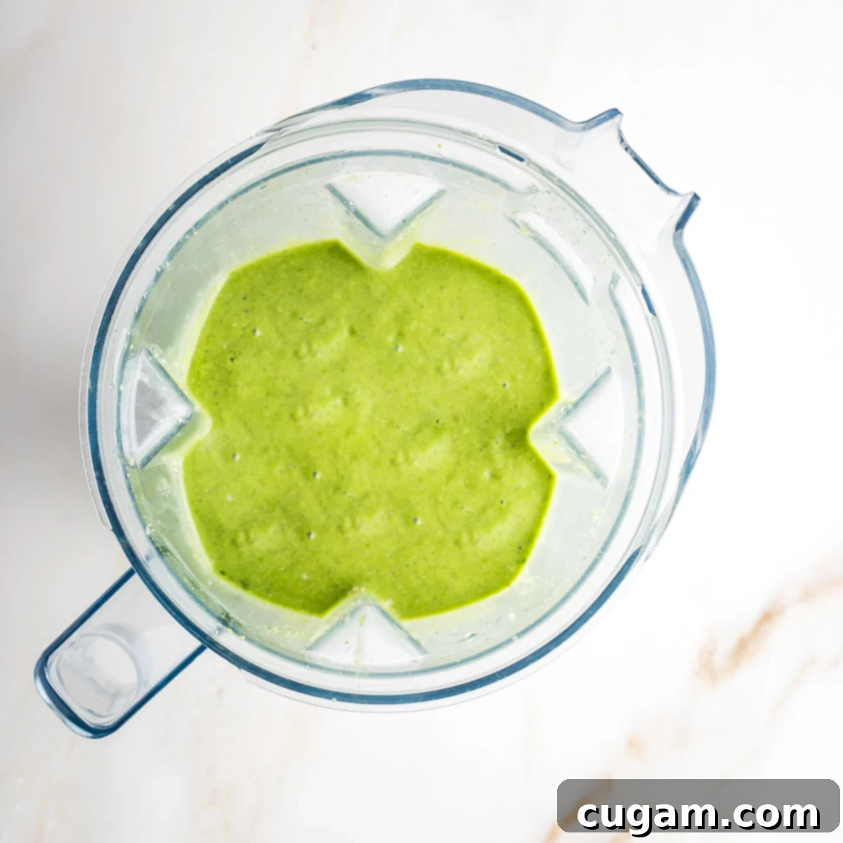 Gorgeous lime green colored smoothie made with kale and avocado.