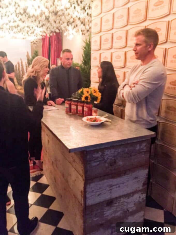 Celebrity guests enjoying the delicious food and convivial atmosphere at the Bertolli Rustic Cut Pasta Sauce launch party in a beautiful setting. #Ad #ReachforRustic