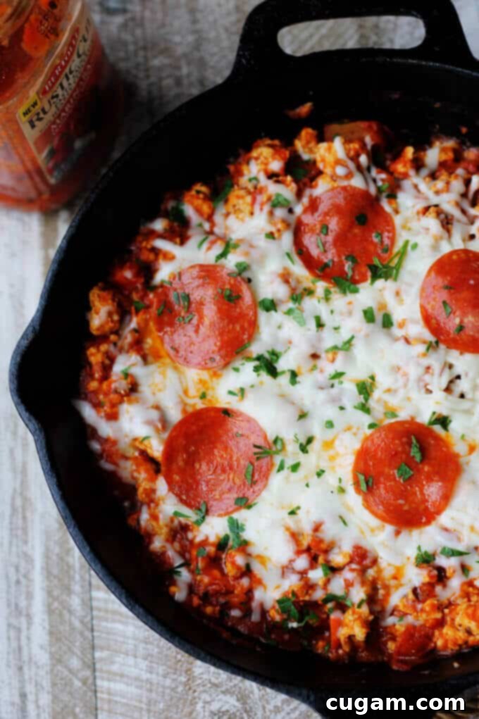 Preparing Skillet Pepperoni Pizza Sloppy Joes: lean ground turkey browning in a skillet, ready for the rich Bertolli Rustic Cut Marinara Sauce. #Ad #ReachforRustic