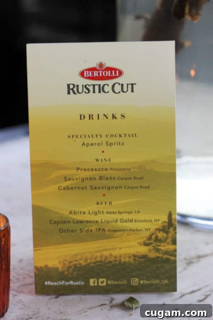 Elegant hors d'oeuvres served at the Bertolli Rustic Cut Pasta Sauce event, showcasing delicious appetizers and a vibrant, artful presentation. #Ad #ReachforRustic