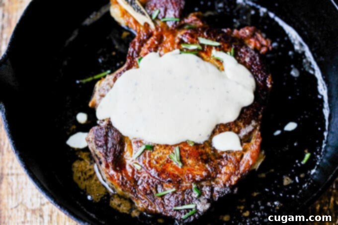 Pan-Seared Ribeye with Cracked Pepper & Mahon Menorca Cheese Sauce is a super easy and quick idea for any Holiday dinner. It just takes 15 minutes, from start to finish. You can’t beat that! #Ad #MahonCheese