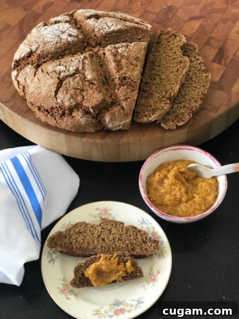 Dark Whole Grain Irish Soda Bread with a shmear of orange marmalade