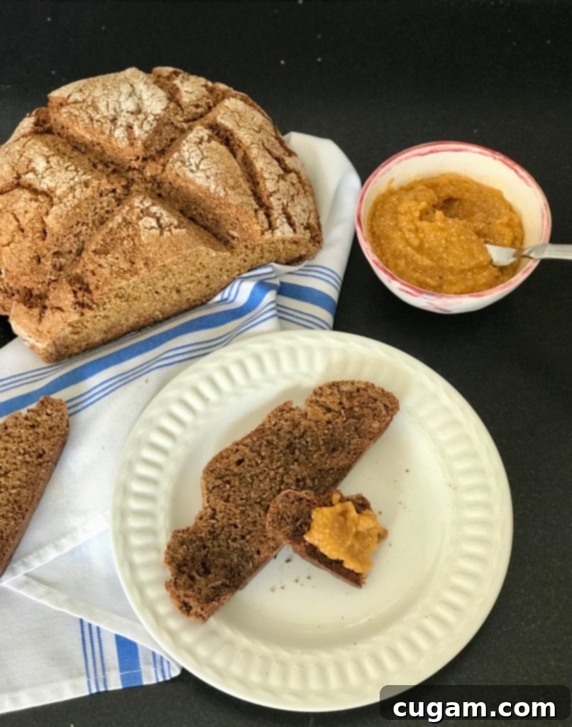 Toasted Whole Grain Irish Soda Bread with a generous spread of orange chia marmalade