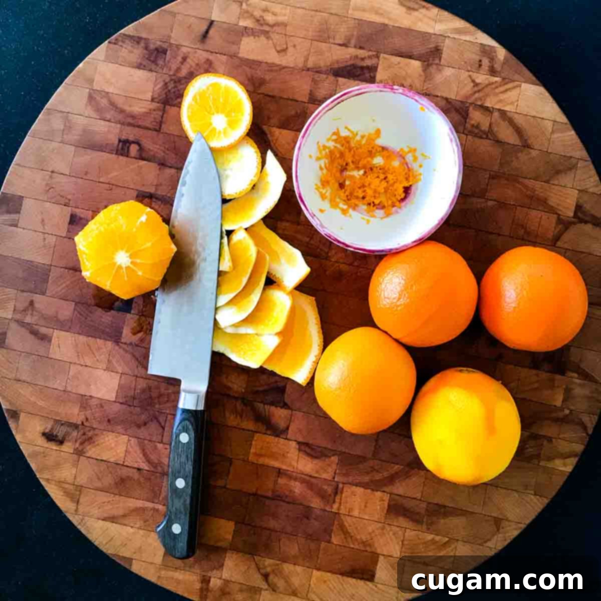 Showing how to use a knife to peel an orange.