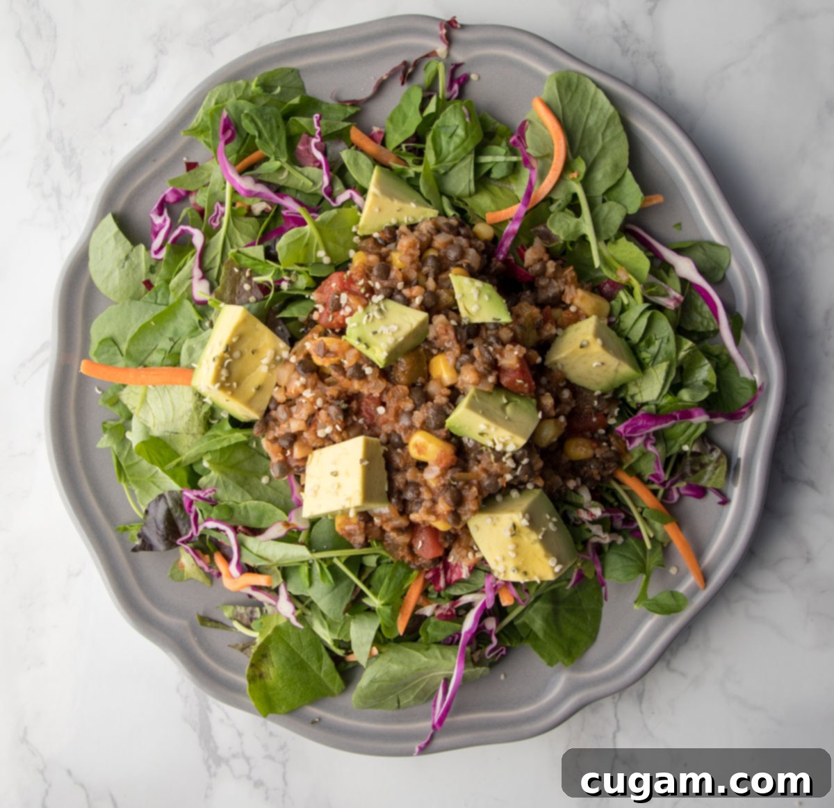 Lentil and Cauli-Rice Stuffing on top of greens for a taco salad.
