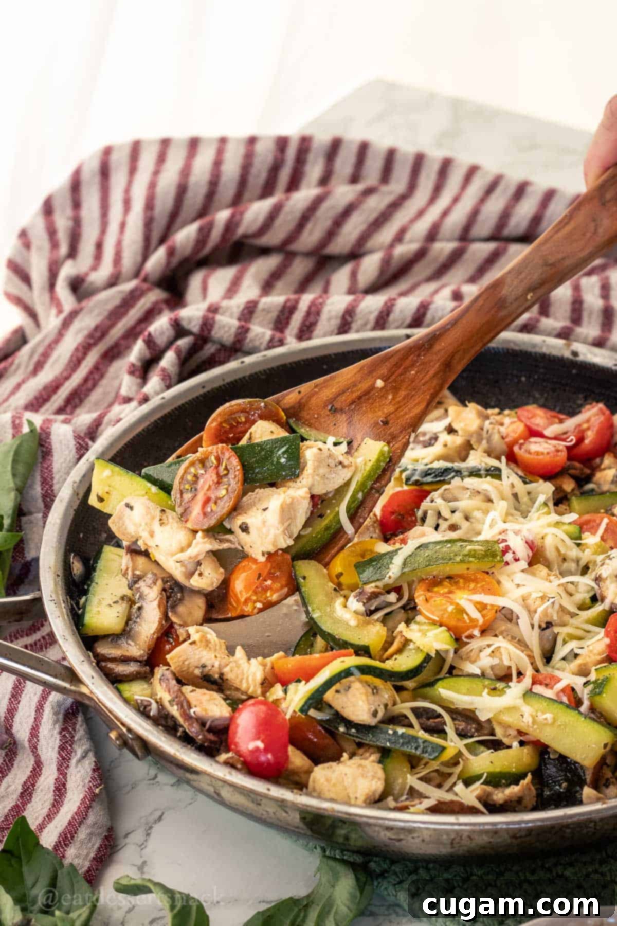 Savory Chicken Zucchini Tomato Skillet 8 Another perspective of the Italian Chicken Zucchini Mushroom Skillet, highlighting the vibrant colors and fresh ingredients ready to be served.