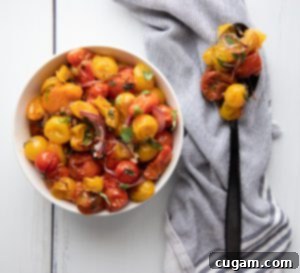 A spoonful of colorful roasted cherry tomatoes
