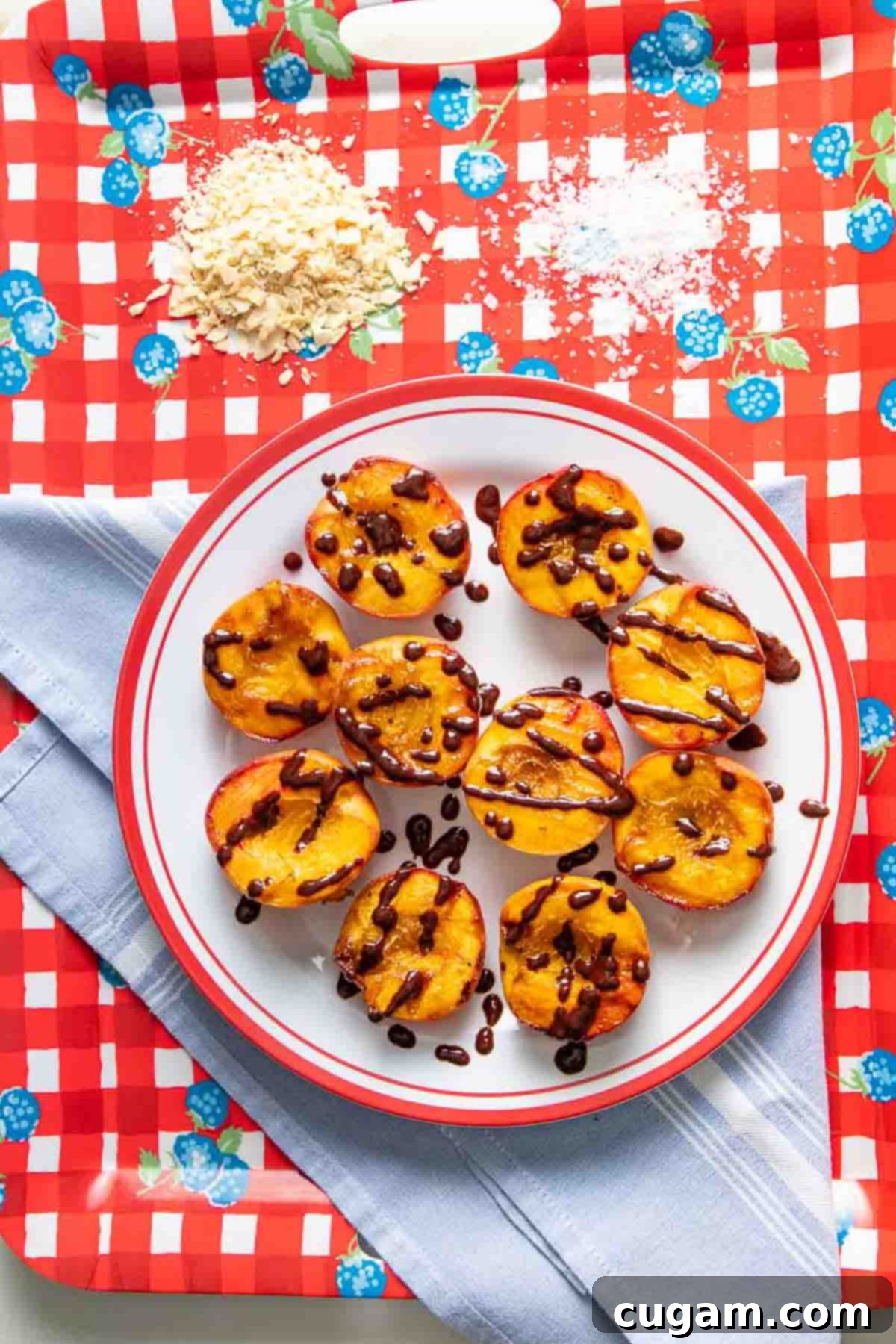 Grilled peaches, drizzled with chocolate balsamic glaze.