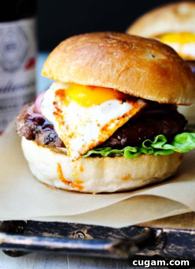 Smoky Burger with fried egg and pickled onions