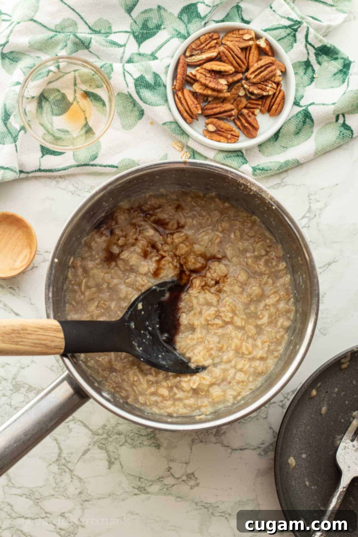 Banana Nut Oatmeal Bliss 7 Vanilla in pot of cooked oatmeal.