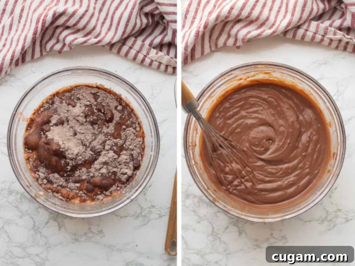 Chocolate pudding mix being whisked into milk in a glass bowl.