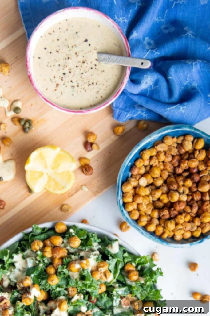 Crunchy Roasted Chickpeas on top of kale plus creamy caesar dressing. 