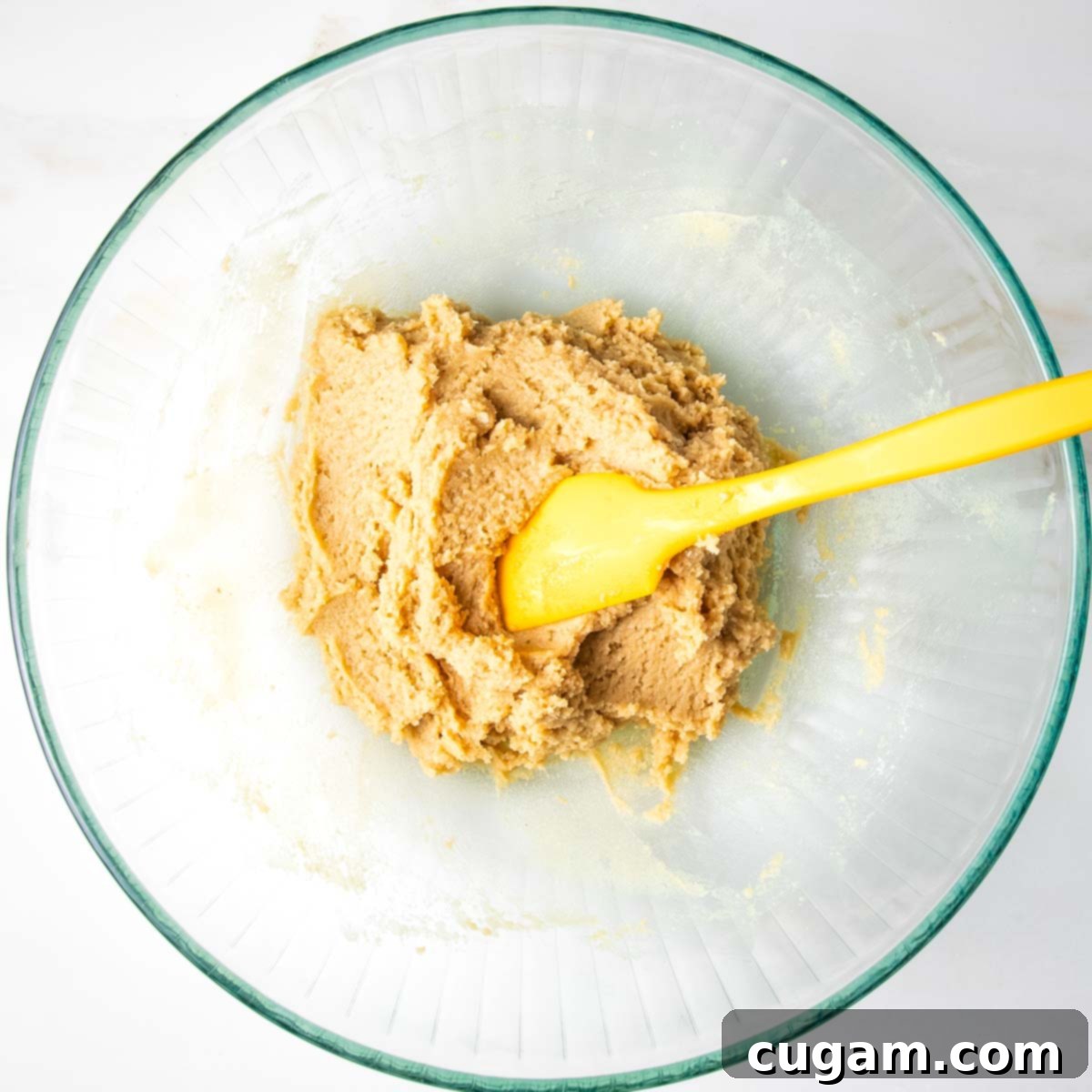Chewy Vegan Gluten Free Chocolate Chunk Cookies 6 Cookie batter forming a sticky ball after combining wet and dry ingredients.