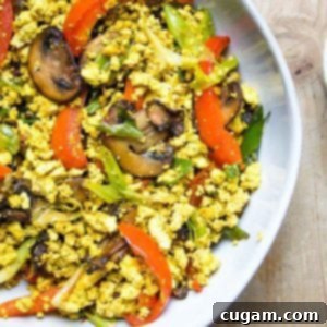 Scrambled tofu with mushrooms, red peppers and scallions