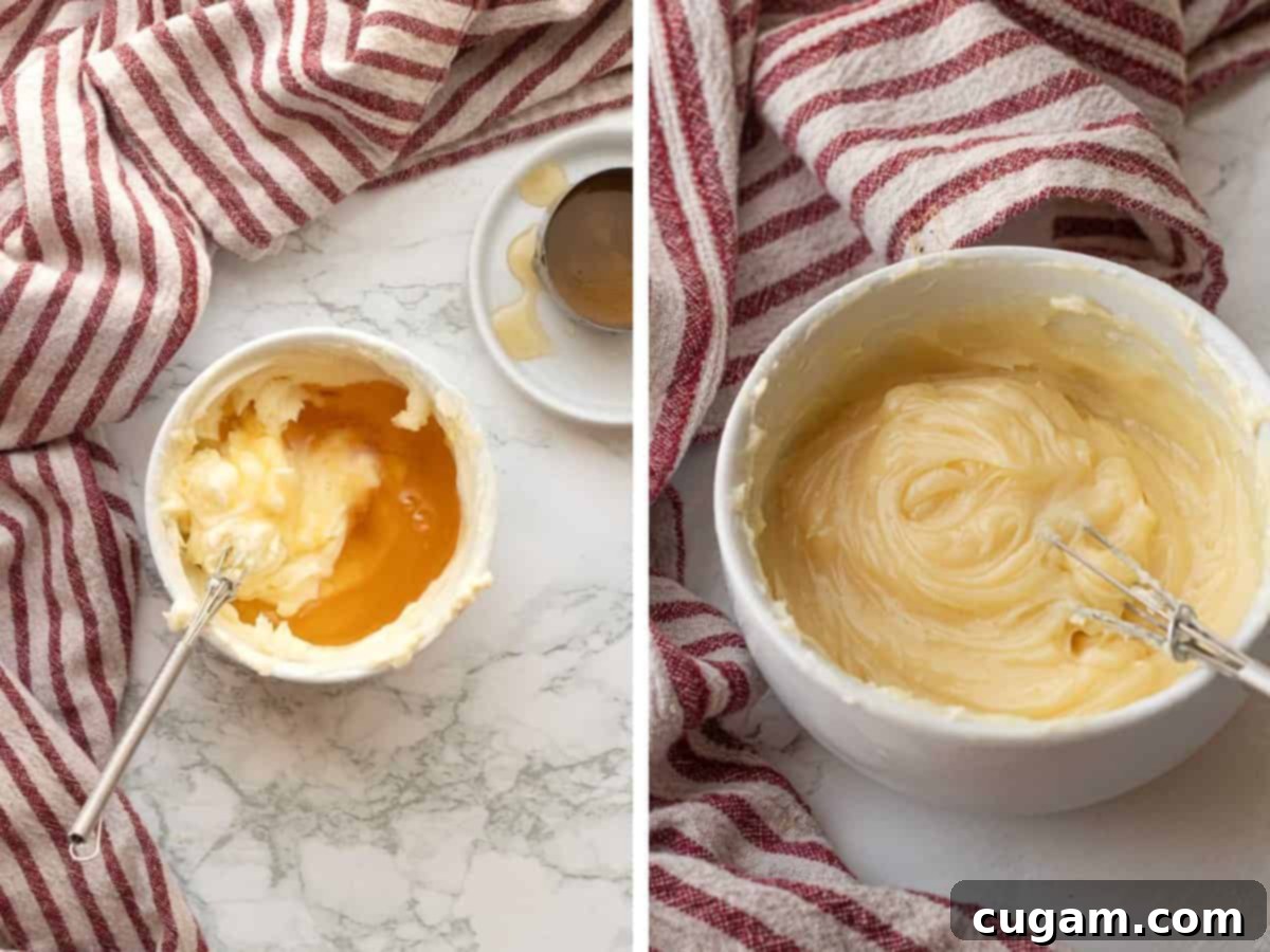 Honey and soft butter in white bowl with whisk.