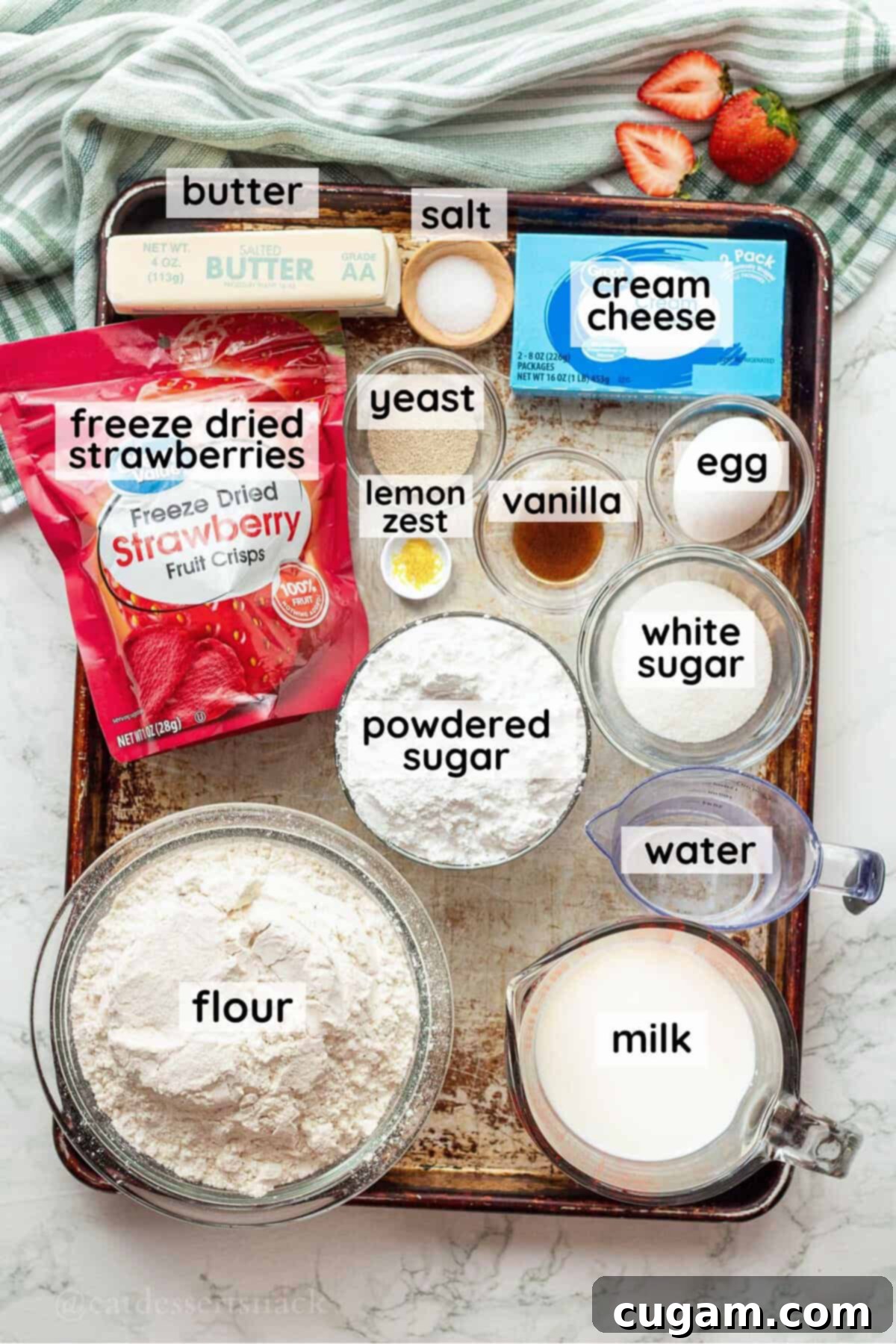 Labeled ingredients for strawberry cheesecake cinnamon rolls.