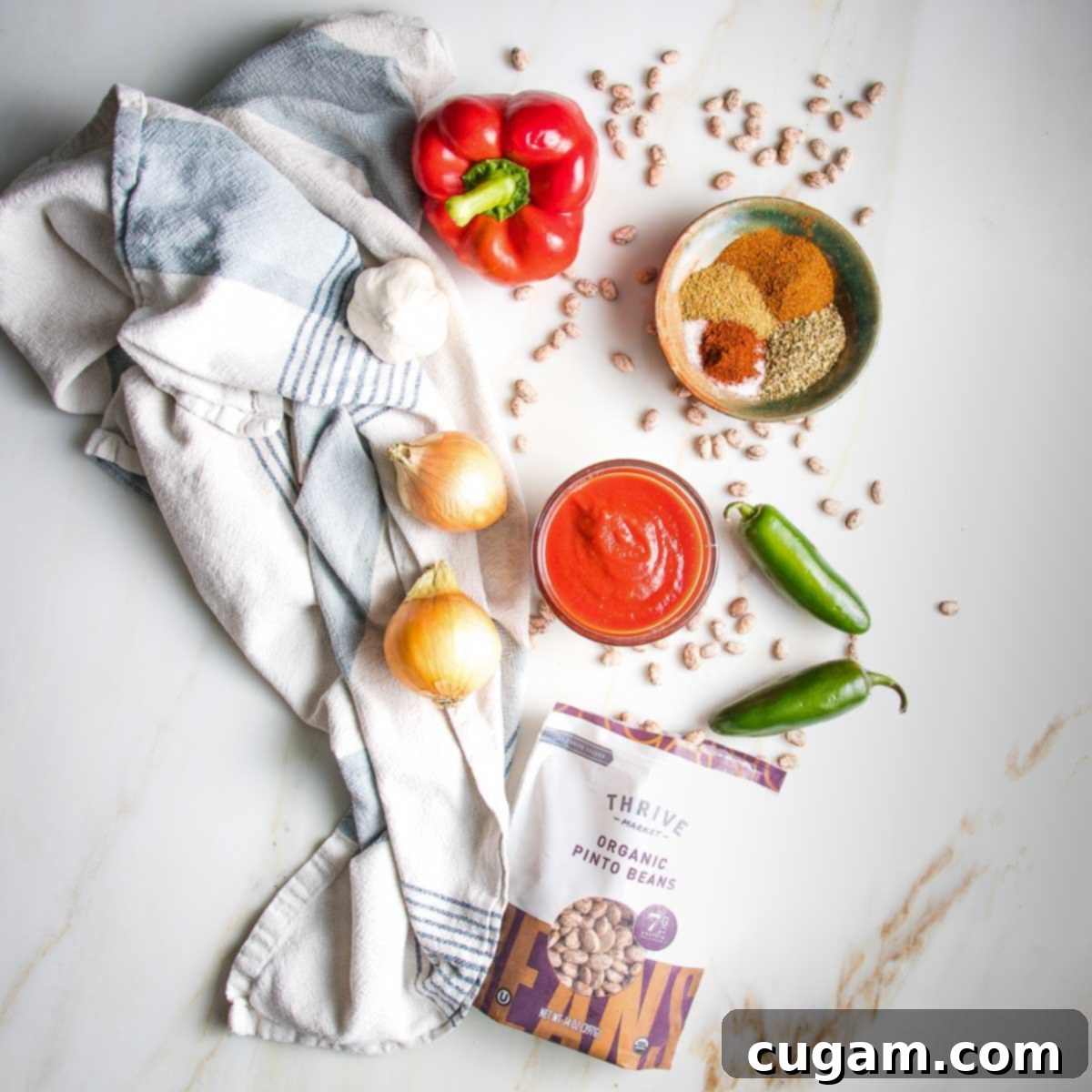 Bell pepper, onions, jalapeno, tomato sauce, spices, dried pinto beans.