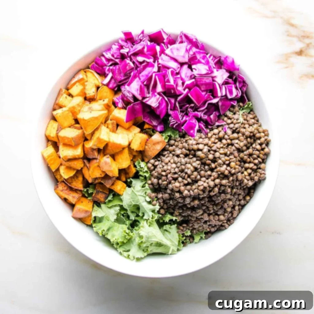 Vibrantly chopped purple cabbage, adding essential crunch and color to the salad.