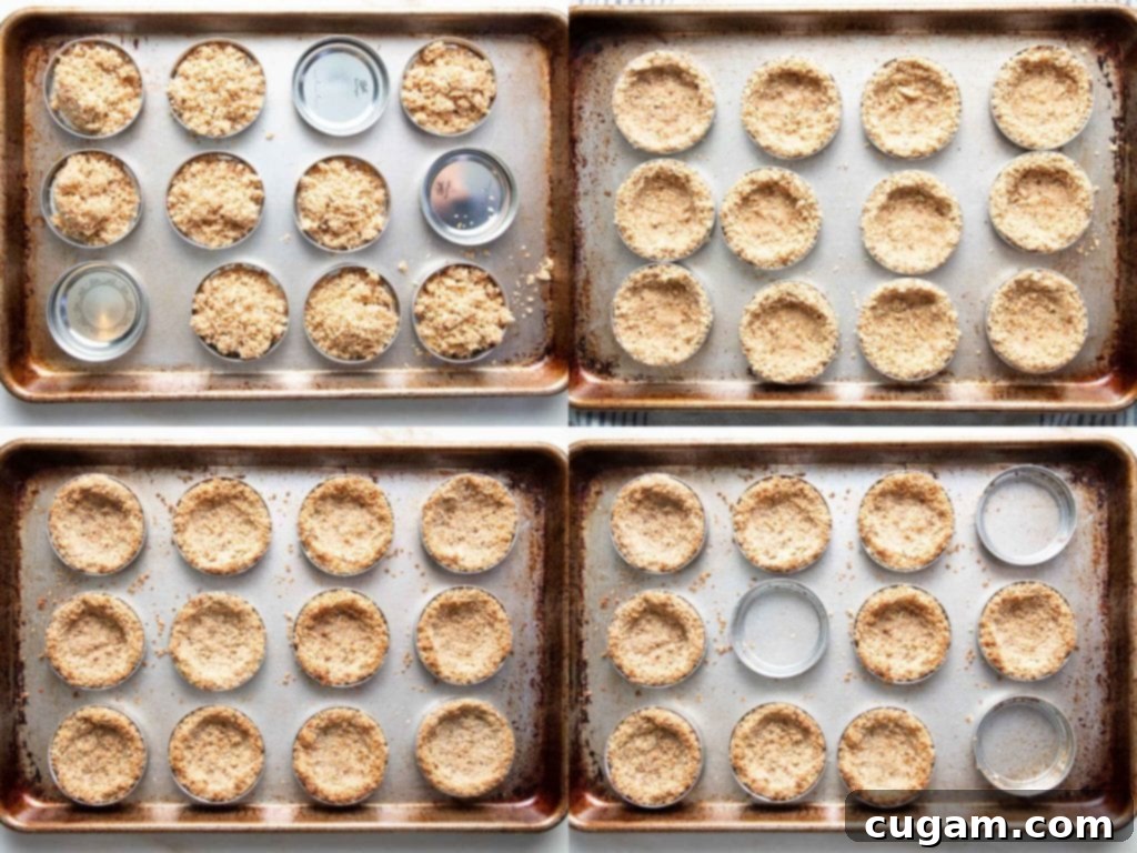 The prepared tart crust, pressed neatly into a tart pan with a removable bottom, ready for baking.