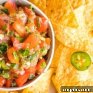 Fresh Tomatoes, Cilantro, Jalapenos and scallions chopped up for a homemade salsa, served with a side of corn chips.
