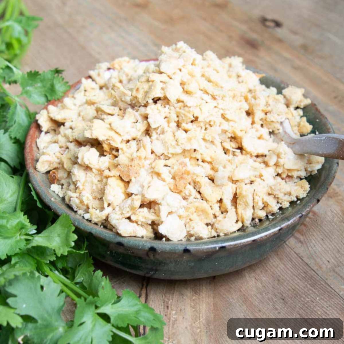 Delicious Vegan Mexican Street Corn 12 Crumbled vegan cheese in a small bowl, ready for sprinkling.