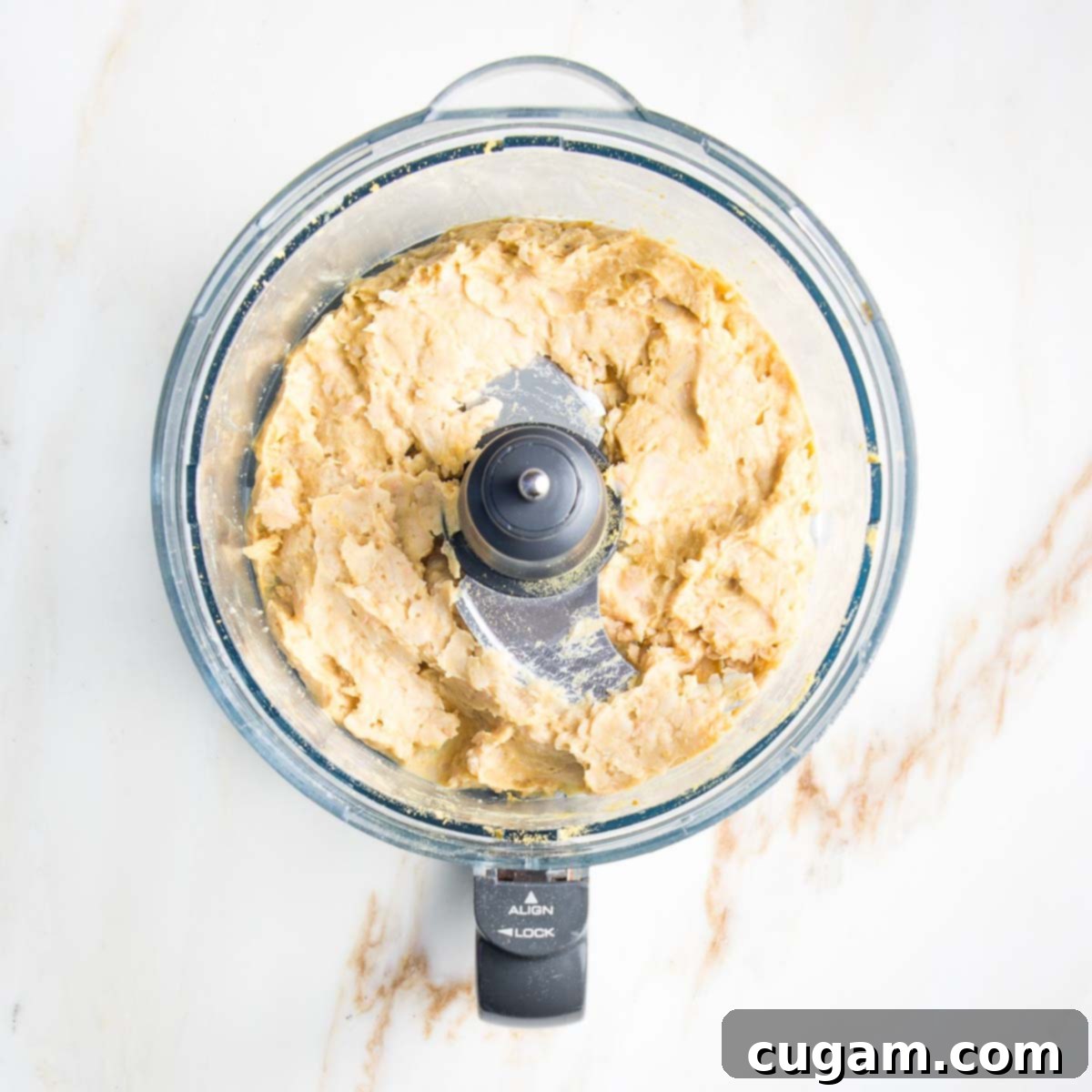 Delicious Vegan Mexican Street Corn 8 Blended bean paste in a food processor bowl, showing a uniform texture.